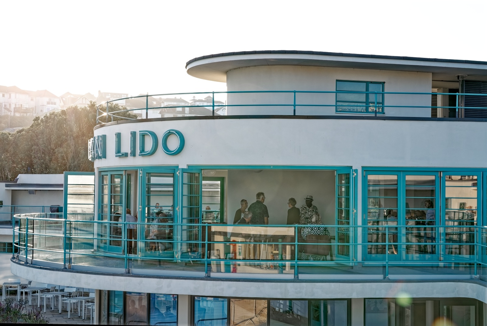 Sunset image of art deco Saltdean Lido.